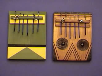 two painted hairpin kalimbas